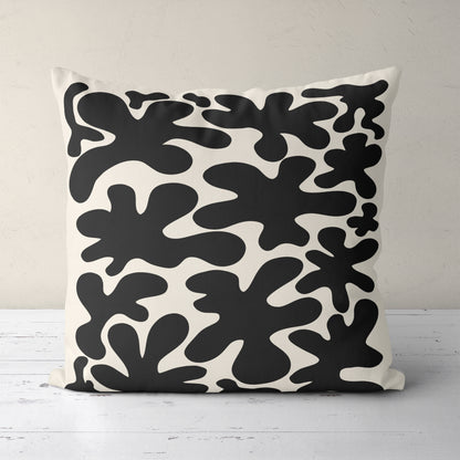 Throw Pillow with Black Botanical Shapes